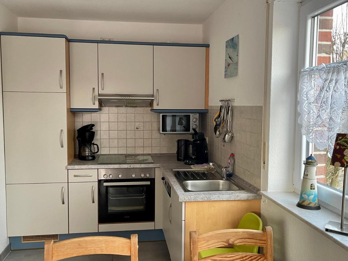Ferienhaus Seehund Krummhörn Buitenkant foto